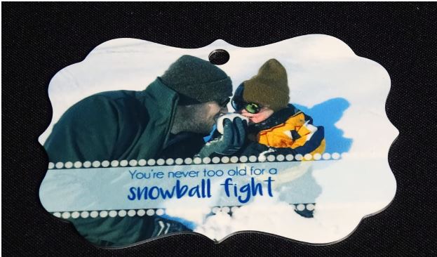 Custom Dye Sublimation Ornament with a snowball design.